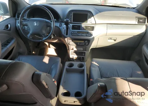 2010 Honda Odyssey Exl z USA, uszkodzony, nr VIN 5FNRL3H77AB083012